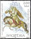 Colnect-609-989-Man-and-Woman-on-Horse-Equus-ferus-caballus.jpg
