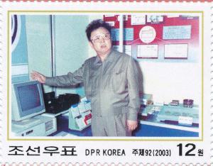 Colnect-3276-451-Kim-Jong-Il-with-computer.jpg