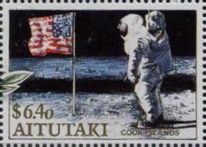Colnect-3462-257-Astronaut-on-the-Moon-with-USA-Flag.jpg