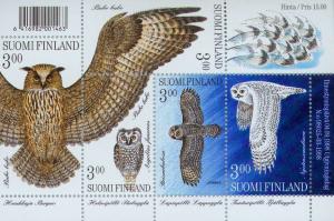 Colnect-160-484-Eurasian-Eagle-Owl-Boreal-Owl-Great-Grey-Owl-Snowy-Owl.jpg