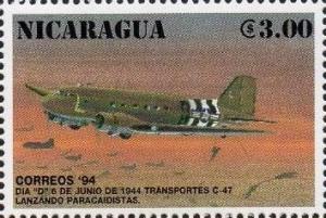 Colnect-4690-898-C-47-transports-dropping-paratroopers.jpg