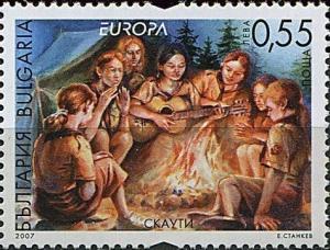 Colnect-4044-711-Girl-Scouts-around-the-Campfire-with-Guitar.jpg