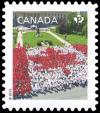 Colnect-2892-307-People-forming-maple-leaf-flag-Canada-Day-Winnipeg.jpg