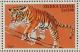 Colnect-1873-929-Tiger-Panthera-tigris-balancing-on-Bars.jpg