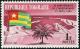 Colnect-573-184-Lom%C3%A9-Harbor-and-Togolese-flag.jpg