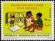 Colnect-1963-030-Reading-children.jpg