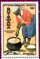 Colnect-1301-141-Woman-Preparing-Bogobe-Cereal-Porridge.jpg