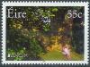 Colnect-1045-986-Small-Girl-Reading-Under-A-Tree.jpg