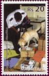 Colnect-2149-314-Handler-with-sniffer-dog-checking-packages-at-the-PPO.jpg