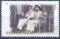 Colnect-2245-395-Royal-couple-seated-at-Coronation-ceremony.jpg