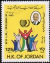 Colnect-1685-988-King-Hussein-Emblem-and-People.jpg