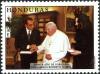 Colnect-4993-035-C-R-Flores-and-his-wife-welcome-Pope-John-Paul-II.jpg