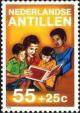 Colnect-954-053-Parents-reading-to-children.jpg