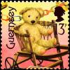 Colnect-5563-868-Small-teddy-bear-in-carriage.jpg