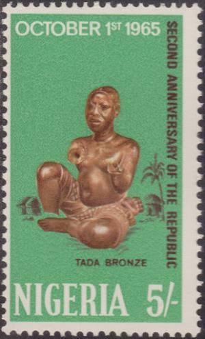 Colnect-1452-354-Seated-man-Taba-bronze.jpg