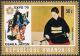 Colnect-3950-179-Kabuki-character-and-woman-playing-samisen.jpg
