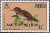 Colnect-1922-304-Pearly-eyed-Thrasher-Margarops-fuscatus.jpg