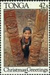 Colnect-3599-546-Boy-with-carved-wood-panels.jpg