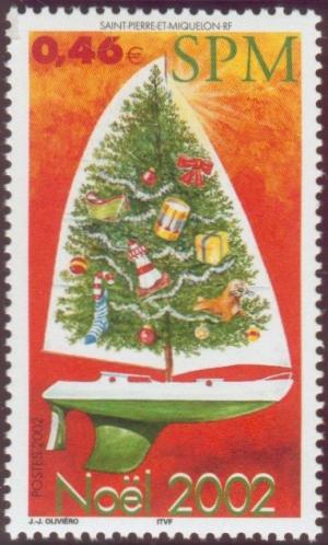 Colnect-878-736-Sailing-boat-with-a-decorated-Christmas-tree.jpg