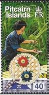 Colnect-3984-697-Woman-cutting-palm-fronds-and-fan.jpg