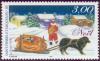 Colnect-877-498-The-Santa--s-sleigh-stopped-in-front-of-a-group-of-houses.jpg