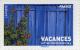 Colnect-587-512-Blue-door-and-roses.jpg
