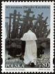 Colnect-4722-595-Pope-John-Paul-II-at-monument-in-Warsaw.jpg