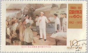 Colnect-2621-777-Kim-Il-Sung-with-Foundry-workers.jpg
