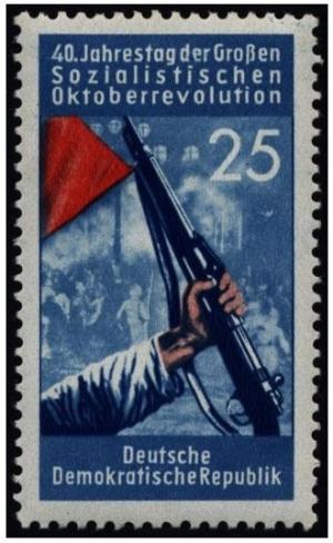 Colnect-892-725-Gun-and-red-flag.jpg