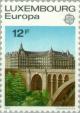 Colnect-134-375-Adolph-Bridge-and-European-Investment-Bank-Luxembourg.jpg