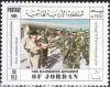 Colnect-3659-545-King-Hussein-greeting-troops.jpg