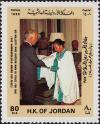 Colnect-3898-919-King-Hussein-receiving-Robes.jpg
