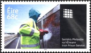 Colnect-2461-483-Irish-Prison-Service---Convict-removing-graffiti.jpg