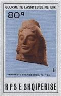 Colnect-1477-411-Terra-cotta-woman-s-head-6th-7th-cent-BC.jpg