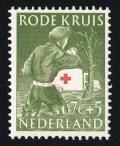Colnect-2192-562-Red-Cross-worker-aiding-at-flooding.jpg