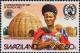 Colnect-4459-025-Swazi-woman-and-beehive-huts.jpg