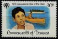 Colnect-1099-097-Boy-and-dugout-canoe.jpg