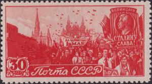 Colnect-3214-846-People-celebrating-May-Day-on-Red-Square-Profile-of-Stalin.jpg