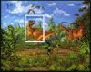 Colnect-1456-371-Carnosaurs-attacking-Hypsilophodonts.jpg