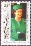 Colnect-4693-487-Queen-Elizabeth-wearing-green-hat.jpg