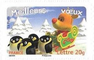 Colnect-4520-278-Penguins-and-reindeer-in-sledge.jpg