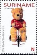 Colnect-3979-160-1958-Bear-on-a-Tricycle.jpg