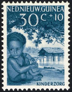 Colnect-2222-367-Papuan-boy-and-pile-dwelling.jpg