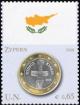 Colnect-2630-894-Flag-of-Cyprus-and-1-euro-coin.jpg