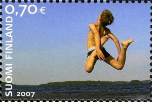 Colnect-586-620-Daring-dive-by-swimming-boy.jpg