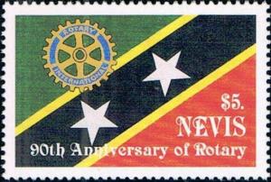 Colnect-5145-650-Rotary-emblem-on-Nevis-flag.jpg