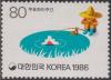 Colnect-1435-881-Boy-fishing-for-stamp.jpg