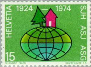 Colnect-140-519-Globe-with-house-and-tree-as-symbol.jpg