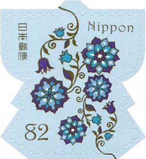 Colnect-5520-434-Flower-Pattern-Karahana-on-Robe-shaped-Stamp.jpg