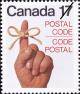 Colnect-748-311-Postal-Code---Knotted-ribbon-on-male-hand.jpg